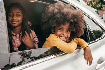 Children in back seat of car