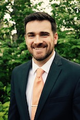 Portrait of Adam Brown, of Enrichment Retirement and Investment Services.